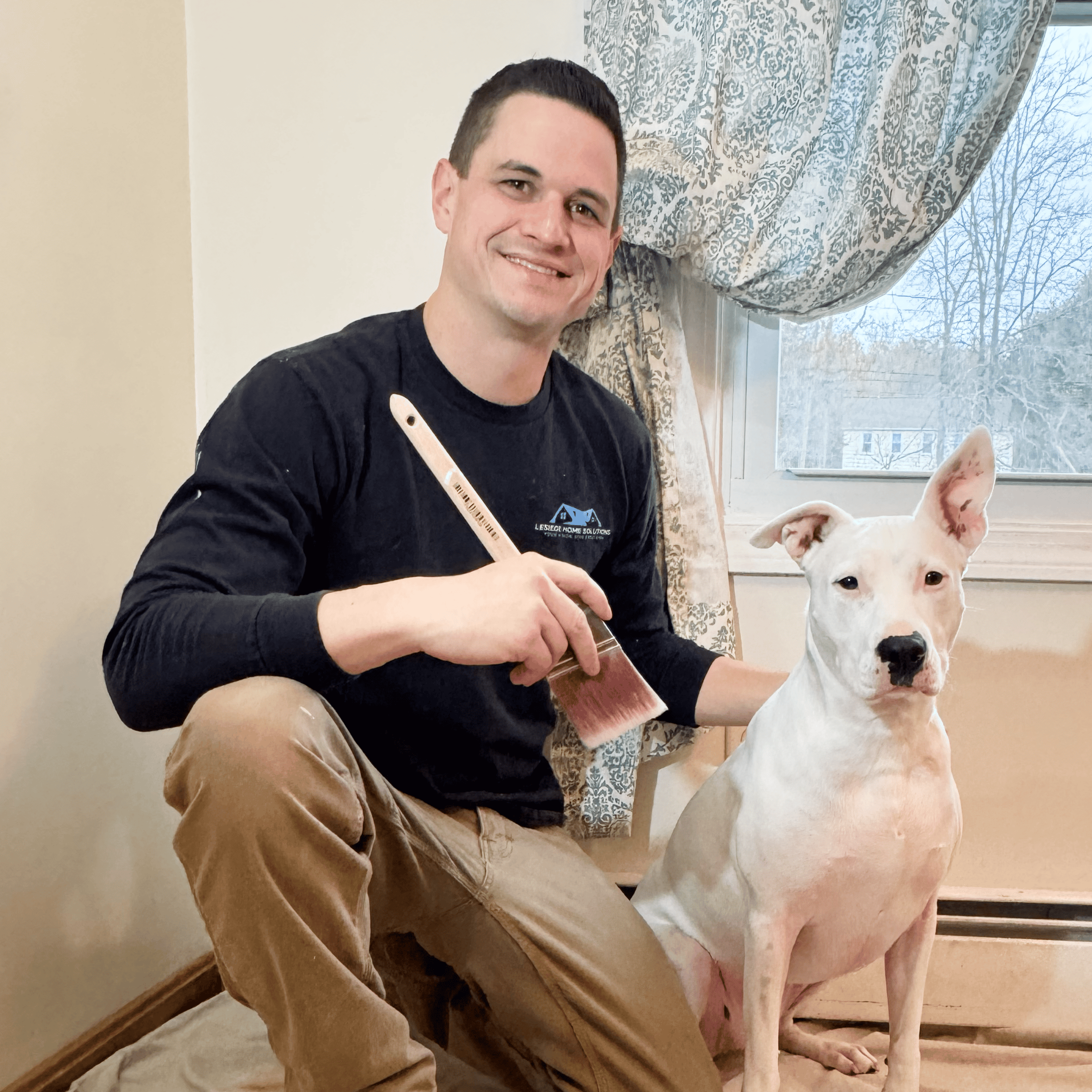 Home Improvement Expert Professional home improvement expert with a dog, working indoors for home renovation projects.